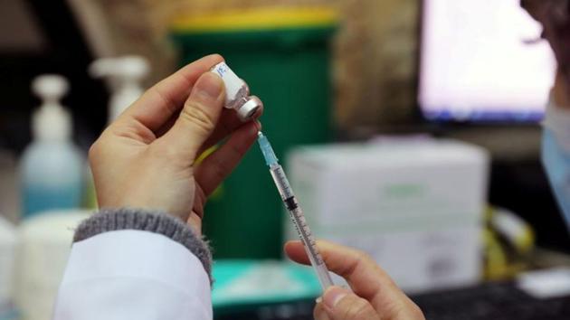 A medical worker prepares a vaccination against the coronavirus disease (Covid-19).(Reuters) A medical worker prepares a vaccination against the coronavirus disease (Covid-19).(Reuters)