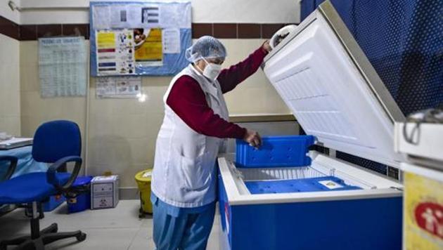In the first phase the vaccine will be administered to 24, 30, 650 beneficiaries which include healthcare workers. (PTI PHOTO.) In the first phase the vaccine will be administered to 24, 30, 650 beneficiaries which include healthcare workers. (PTI PHOTO.)