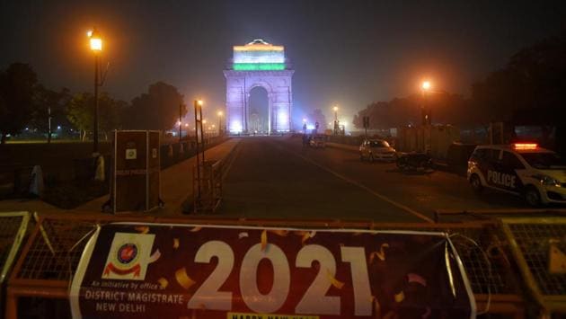 India Gate on New Year's Eve in New Delhi, devoid of the thousands that throng to ring in the new year. In several Indian metros night curfews were enforced to keep people indoors and to avoid infections spreading. (Amal KS / HT Photo)