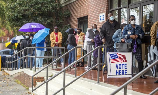Voters wait in line for Georgia's Senate runoff election at the Bell Auditorium in Augusta, Georgia (AP/ File photo) Voters wait in line for Georgia's Senate runoff election at the Bell Auditorium in Augusta, Georgia (AP/ File photo)