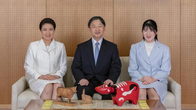 In this photo provided by the Imperial Household Agency of Japan, Japan's Emperor Naruhito, center, Empress Masako, left, and their daughter Princess Aiko pose for a photograph during a family photo session for the New Year at their Akasaka Estate residence in Tokyo, on Dec. 21, 2020. (The Imperial Household Agency of Japan via AP) In this photo provided by the Imperial Household Agency of Japan, Japan's Emperor Naruhito, center, Empress Masako, left, and their daughter Princess Aiko pose for a photograph during a family photo session for the New Year at their Akasaka Estate residence in Tokyo, on Dec. 21, 2020. (The Imperial Household Agency of Japan via AP)