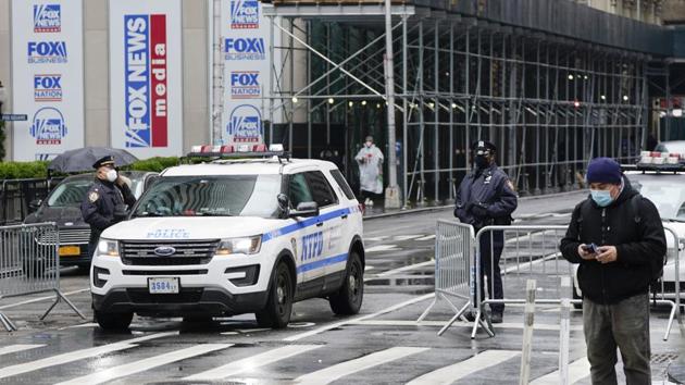 New York Police officers block a street leaving Times Square ahead of the New Year's Celebration Thursday, Dec. 31, 2020, in New York. (AP Photo/Frank Franklin II) New York Police officers block a street leaving Times Square ahead of the New Year's Celebration Thursday, Dec. 31, 2020, in New York. (AP Photo/Frank Franklin II)