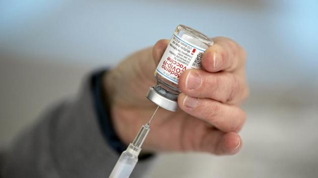A nurse prepares a dose of the COVID-19 vaccine as the Wayne County Health Department administers COVID-19 vaccines for anyone 80 years of age or older at a drive-thru site on Thursday, Dec. 31, 2020, in Wayne, W.Va. (Sholten Singer/The Herald-Dispatch via AP) A nurse prepares a dose of the COVID-19 vaccine as the Wayne County Health Department administers COVID-19 vaccines for anyone 80 years of age or older at a drive-thru site on Thursday, Dec. 31, 2020, in Wayne, W.Va. (Sholten Singer/The Herald-Dispatch via AP)
