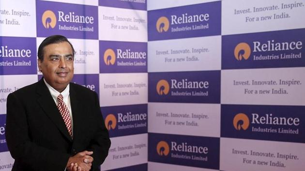 Mukesh Ambani, chairman of Reliance Industries Limited, poses for photographers before addressing the annual shareholders meeting in Mumbai, India. (REUTERS) Mukesh Ambani, chairman of Reliance Industries Limited, poses for photographers before addressing the annual shareholders meeting in Mumbai, India. (REUTERS)