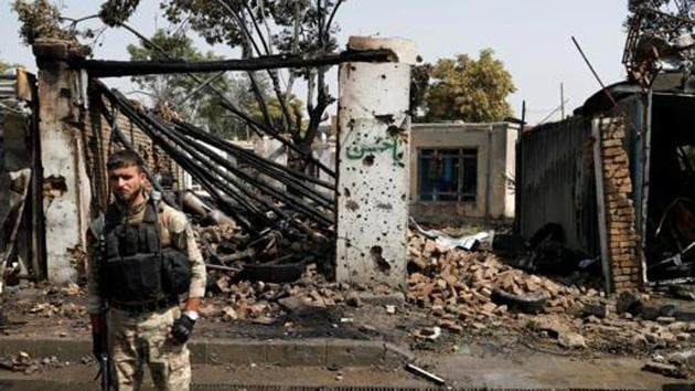 An Afghan security force member inspects at the site of a blast in Kabul, Afghanistan. (REUTERS) An Afghan security force member inspects at the site of a blast in Kabul, Afghanistan. (REUTERS)