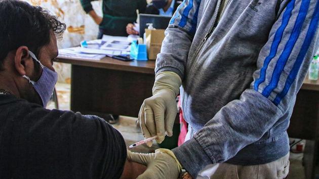 A volunteer being vaccinated by a medic during the Bharat Biotech's 'Covaxin' human trial in Jaipur.(PTI)