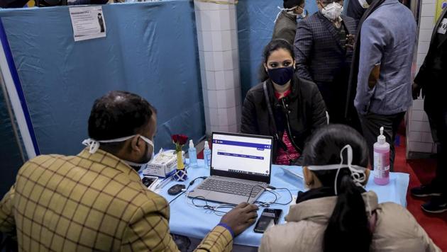 Health workers prepare for the dry run of the Covid-19 vaccine at a healthcare center in Daryaganj, New Delhi, on Saturday. (PTI Photo) Health workers prepare for the dry run of the Covid-19 vaccine at a healthcare center in Daryaganj, New Delhi, on Saturday. (PTI Photo)
