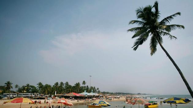 File photo: Tourists relax at a cafe on Baga beach in Goa.(REUTERS) File photo: Tourists relax at a cafe on Baga beach in Goa.(REUTERS)