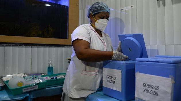 A health official prepares a vaccine kit as she takes part in the dry run at a primary health centre in Chennai on January 2. The teams conducting the run were provided vaccine carriers (cold-box) that will be used to transport vaccines at the temperature they are meant to be stored from the cold-chain points to the vaccination sites. (Arun Sankar / AFP) A health official prepares a vaccine kit as she takes part in the dry run at a primary health centre in Chennai on January 2. The teams conducting the run were provided vaccine carriers (cold-box) that will be used to transport vaccines at the temperature they are meant to be stored from the cold-chain points to the vaccination sites. (Arun Sankar / AFP)