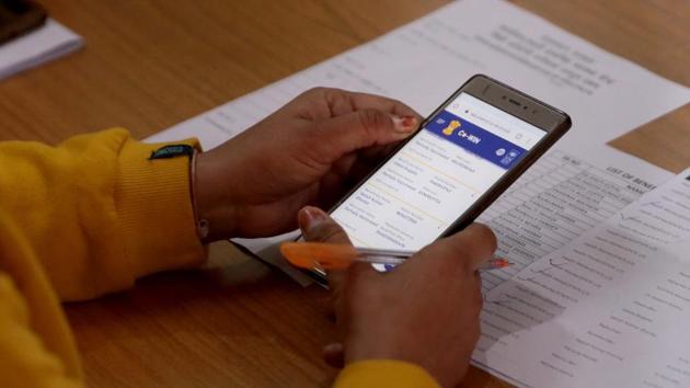 A medical staff operates the Co-WIN application during the dry run in Jaipur on January 2. According to Union Health Ministry, the objective of the dry run is to “assess operational feasibility in the use of COVID Vaccine Intelligence Network (Co-WIN) application in field environment, to test the linkages between planning and implementation and to identify the challenges and guide way forward prior to actual implementation”. (Himanshu Vyas / HT Photo) A medical staff operates the Co-WIN application during the dry run in Jaipur on January 2. According to Union Health Ministry, the objective of the dry run is to “assess operational feasibility in the use of COVID Vaccine Intelligence Network (Co-WIN) application in field environment, to test the linkages between planning and implementation and to identify the challenges and guide way forward prior to actual implementation”. (Himanshu Vyas / HT Photo)