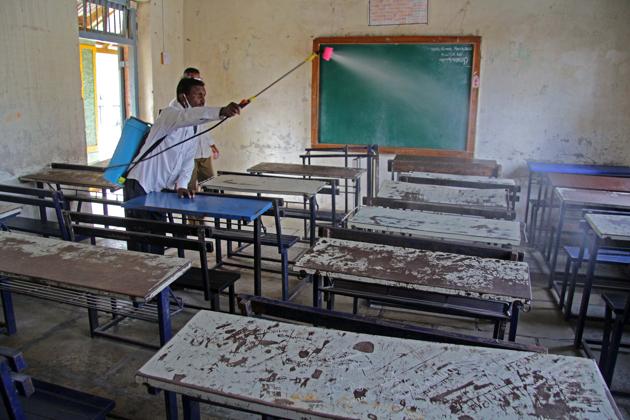 A worker sanitizes classroom at Shivbhumi Vidyalay and Junior college, Khed Shivapur (HT FILE) A worker sanitizes classroom at Shivbhumi Vidyalay and Junior college, Khed Shivapur (HT FILE)