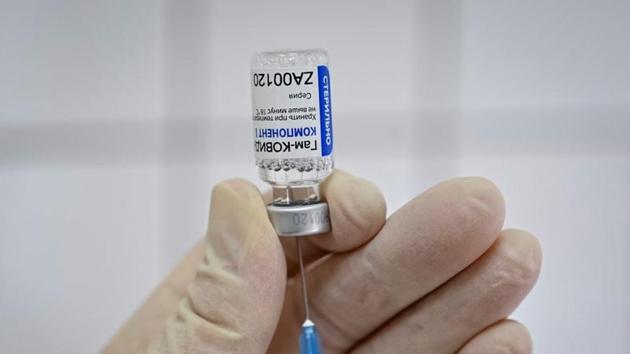 A medical worker fills a syringe with Sputnik V (Gam-COVID-Vac) vaccine as she prepares to vaccinate a Russian Army service member at a clinic in the city of Rostov-On-Don, Russia.(REUTERS) A medical worker fills a syringe with Sputnik V (Gam-COVID-Vac) vaccine as she prepares to vaccinate a Russian Army service member at a clinic in the city of Rostov-On-Don, Russia.(REUTERS)