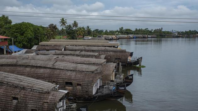 Some of the hundreds of house boats that have been lying anchored in the backwaters for months after tourism activity was halted due to the COVID-19 pandemic in Alappuzha, Kerala.(AP) Some of the hundreds of house boats that have been lying anchored in the backwaters for months after tourism activity was halted due to the COVID-19 pandemic in Alappuzha, Kerala.(AP)