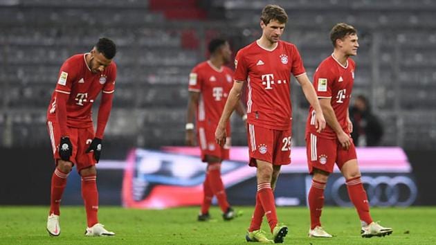 Bayern Munich players react after losing 0-2.(Getty Images)