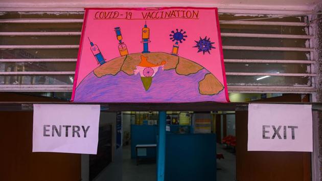 A view showing the entry and exit gates of Delhi’s first Covid-19 vaccination centre set up in Daryaganj on January 1. The Drugs Controller General of India (DCGI) on January 3 approved the Oxford University-AstraZeneca Plc. Covid-19 vaccine, Covishield, and Bharat Biotech International Limited’s Covaxin for restricted emergency use, clearing the way for the government’s vaccination drive in about 10 days. (Amal KS / HT Photo) A view showing the entry and exit gates of Delhi’s first Covid-19 vaccination centre set up in Daryaganj on January 1. The Drugs Controller General of India (DCGI) on January 3 approved the Oxford University-AstraZeneca Plc. Covid-19 vaccine, Covishield, and Bharat Biotech International Limited’s Covaxin for restricted emergency use, clearing the way for the government’s vaccination drive in about 10 days. (Amal KS / HT Photo)