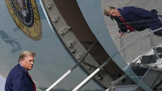 President Donald Trump boards Air Force One at Palm Beach International Airport in West Palm Beach. (AP) President Donald Trump boards Air Force One at Palm Beach International Airport in West Palm Beach. (AP)