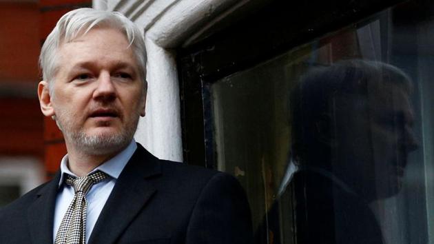 WikiLeaks founder Julian Assange making a speech from the balcony of the Ecuadorian Embassy, in central London, Britain on February 5, 2016.(Reuters File Photo)