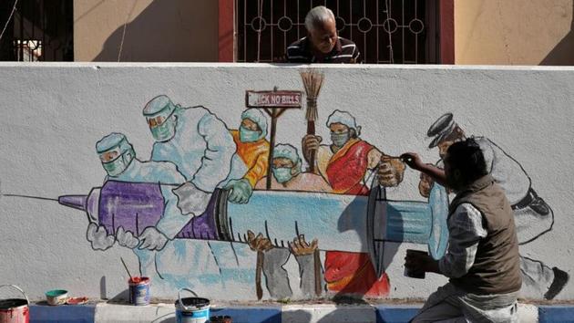 A man applies finishing touches to graffiti representing a vaccine, in Kolkata on January 2. The vaccine will be sold on the private market at ₹1,000, Poonawalla told AP. He said vaccines could be delivered to states where they were needed within seven to ten days of the company finalising a deal with the Centre. (Rupak De Chowdhuri / REUTERS) A man applies finishing touches to graffiti representing a vaccine, in Kolkata on January 2. The vaccine will be sold on the private market at ₹1,000, Poonawalla told AP. He said vaccines could be delivered to states where they were needed within seven to ten days of the company finalising a deal with the Centre. (Rupak De Chowdhuri / REUTERS)