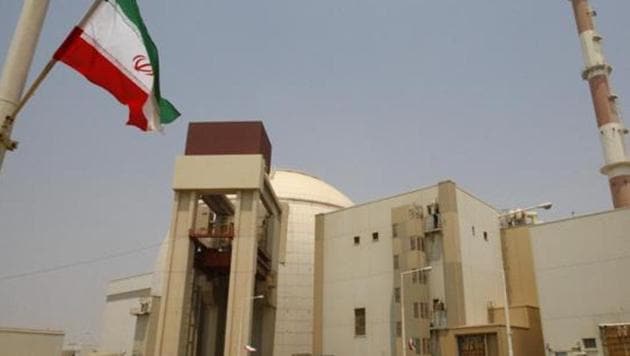 An Iranian flag flutters in front of the reactor building of the Bushehr nuclear power plant, just outside the southern city of Bushehr, Iran.(AP) An Iranian flag flutters in front of the reactor building of the Bushehr nuclear power plant, just outside the southern city of Bushehr, Iran.(AP)