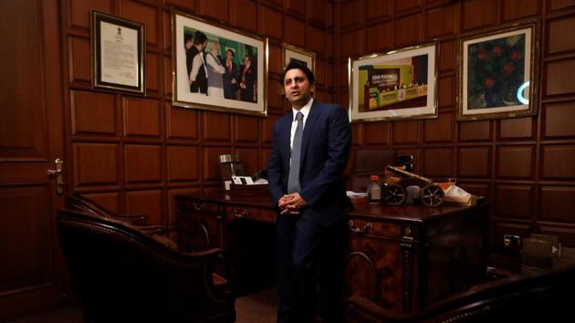 Adar Poonawalla, Chief Executive Officer (CEO) of the Serum Institute of India poses for a picture inside his office at the Serum Institute of India, in Pune.(REUTERS)