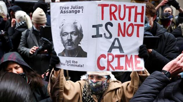 People celebrate after a judge ruled that WikiLeaks founder Julian Assange should not be extradited to the United States, outside the Old Bailey, the Central Criminal Court, in London, Britain. (Reuters) People celebrate after a judge ruled that WikiLeaks founder Julian Assange should not be extradited to the United States, outside the Old Bailey, the Central Criminal Court, in London, Britain. (Reuters)