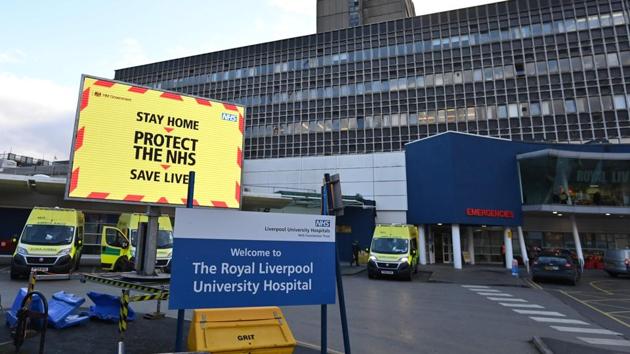 An NHS digital display shows a Covid-19 warning outside Royal Liverpool University hospital in Liverpool on January 5. Moving a few hours ahead of Johnson, Scottish First Minister Nicola Sturgeon also imposed the most stringent lockdown for Scotland since last spring. (Paul Ellis / AFP) An NHS digital display shows a Covid-19 warning outside Royal Liverpool University hospital in Liverpool on January 5. Moving a few hours ahead of Johnson, Scottish First Minister Nicola Sturgeon also imposed the most stringent lockdown for Scotland since last spring. (Paul Ellis / AFP)