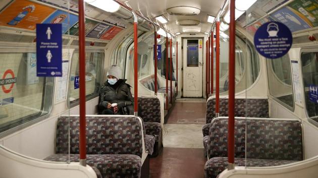 Commuters ride on a London Underground train on the Bakerloo Line on January 5. Britain’s economy suffered a historic crash of nearly 20% in the April-June period of 2020 as swathes of business were shuttered by the first lockdown. (Hollie Adams / Bloomberg) Commuters ride on a London Underground train on the Bakerloo Line on January 5. Britain’s economy suffered a historic crash of nearly 20% in the April-June period of 2020 as swathes of business were shuttered by the first lockdown. (Hollie Adams / Bloomberg)