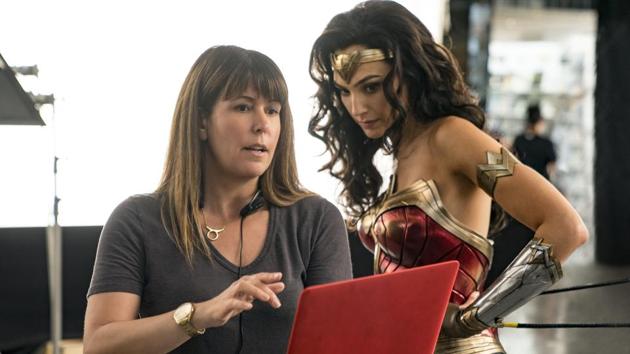 This image released by Warner Bros. Entertainment shows director Patty Jenkins, left, with actress Gal Gadot on the set of Wonder Woman 1984.(AP)