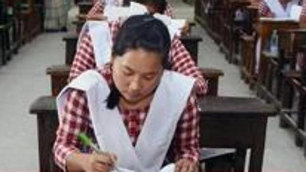 File photo: School girls appear for an examination.(PTI)