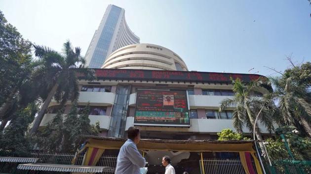 People walk past the Bombay Stock Exchange (BSE) building in Mumbai, India.(REUTERS)