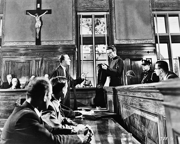 Another taut courtroom drama: A scene from Alfred Hitchcock's 1953 film I Confess, starring Montgomery Clift as Michael Logan and Brian Aherne as Willy Robertson.(Corbis via Getty Images) Another taut courtroom drama: A scene from Alfred Hitchcock's 1953 film I Confess, starring Montgomery Clift as Michael Logan and Brian Aherne as Willy Robertson.(Corbis via Getty Images)