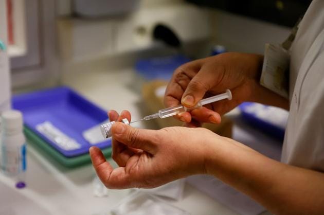 In the United States, only about 4.5 million people had received their first shot as of Monday, the US Centers for Disease Control and Prevention reported(REUTERS) In the United States, only about 4.5 million people had received their first shot as of Monday, the US Centers for Disease Control and Prevention reported(REUTERS)