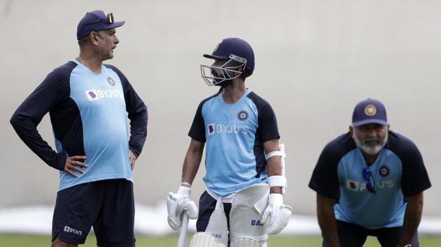 India's captain, Ajinkya Rahane, center, talks with head coach Ravi Shastri Indian players train in Sydney, Tuesday, Jan. 5, 2021, ahead of their cricket test against Australia starting Thursday.(AP)