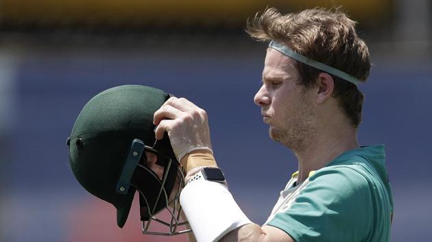 Australia's Steve Smith prepares to put on his helmet before batting in the nets as they train at the Sydney Cricket Ground in Sydney, Tuesday, Jan. 5, 2021, ahead of their cricket test against India starting Thursday.(AP) Australia's Steve Smith prepares to put on his helmet before batting in the nets as they train at the Sydney Cricket Ground in Sydney, Tuesday, Jan. 5, 2021, ahead of their cricket test against India starting Thursday.(AP)