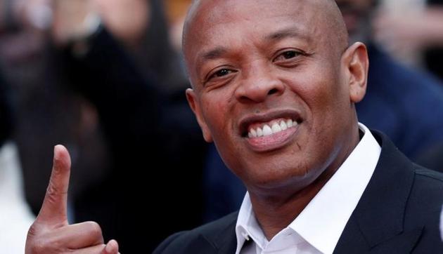 Dr. Dre attends a ceremony for composer Quincy Jones to place his hand and footprints in cement in the forecourt of the TCL Chinese theatre in Los Angeles.(REUTERS) Dr. Dre attends a ceremony for composer Quincy Jones to place his hand and footprints in cement in the forecourt of the TCL Chinese theatre in Los Angeles.(REUTERS)