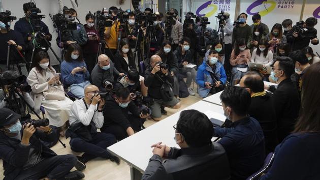 Pro-democratic party members respond to the mass arrests during a press conference in Hong Kong.(AP Photo) Pro-democratic party members respond to the mass arrests during a press conference in Hong Kong.(AP Photo)