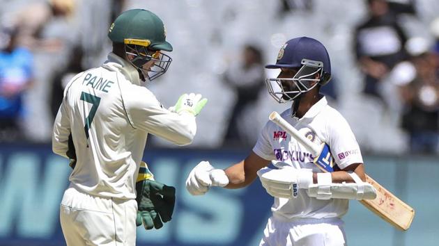 Melbourne:Australian captain Tim Paine, left, congratulates Indian captain Ajinkya Rahane after winning the second cricket test at the Melbourne Cricket Ground, Melbourne, Australia, Tuesday, Dec. 29, 2020. India defeated Australia by eight wickets to level the series at 1-1.(AP)