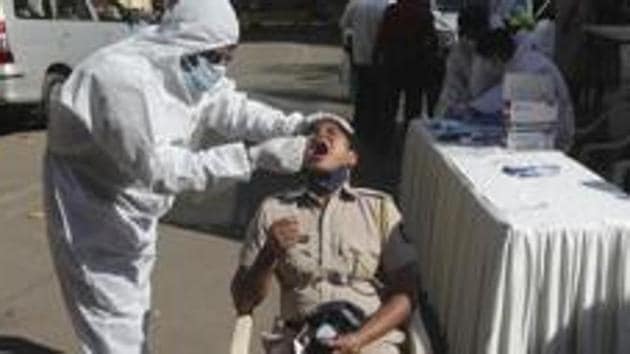 At least 32 Delhi Police personnel have lost their lives due to the coronavirus disease (Covid-19) since May last year. (AP file photo) At least 32 Delhi Police personnel have lost their lives due to the coronavirus disease (Covid-19) since May last year. (AP file photo)