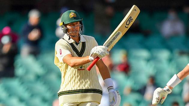 Marnus Labuschagne raises his bat after fifty(Getty)