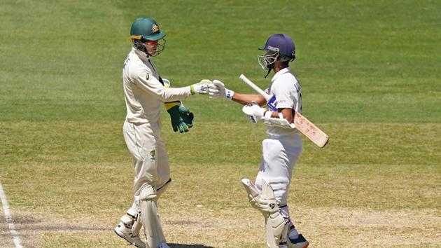 Tim Paine of Australia congratulates India's Ajinkya Rahane after India won the match during day four of the second test match between Australia and India at The MCG, Melbourne, Australia, December 29, 2020. AAP Image/Scott Barbour via REUTERS ATTENTION EDITORS - THIS IMAGE WAS PROVIDED BY A THIRD PARTY. NO RESALES. NO ARCHIVE. AUSTRALIA OUT. NEW ZEALAND OUT(via REUTERS)