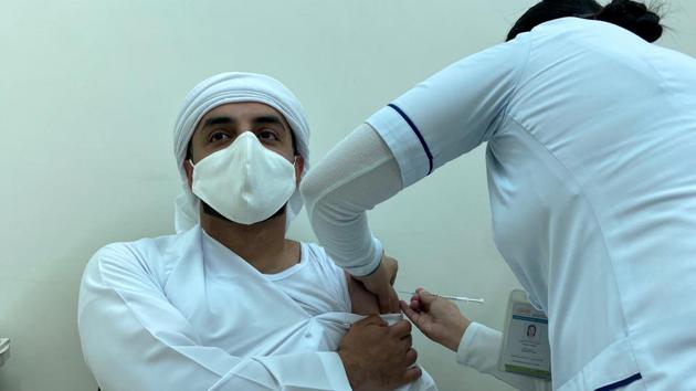 FILE PHOTO: A man receives a dose of a vaccine against the coronavirus disease (COVID-19), in Dubai, United Arab Emirates December 28, 2020. Picture taken December 28, 2020.(REUTERS)