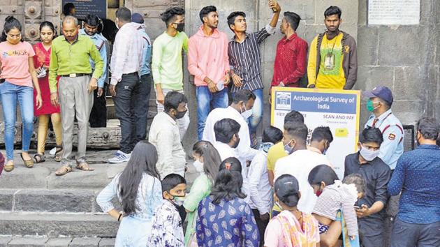 Visitors were seen at Shaniwarwada for the first time in nine months after it remained shut due to Covid-19.(Shankar Narayan/HT PHOTO)