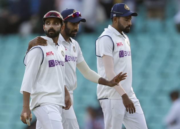 Sydney: Indian captain Ajinkya Rahane, left, walks from the field with teammate Jasprit Bumrah following play on day one of the third cricket test between India and Australia at the Sydney Cricket Ground, Sydney, Australia, Thursday, Jan. 7, 2021. AP/PTI(AP01_07_2021_000066B) (AP)