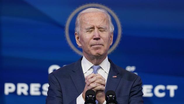 President-elect Joe Biden speaks at The Queen theater in Wilmington on January 6. Biden called the violent protests on the U.S. Capitol "an assault on the most sacred of American undertakings: the doing of the people's business." (Susan Walsh / AP) President-elect Joe Biden speaks at The Queen theater in Wilmington on January 6. Biden called the violent protests on the U.S. Capitol "an assault on the most sacred of American undertakings: the doing of the people's business." (Susan Walsh / AP)