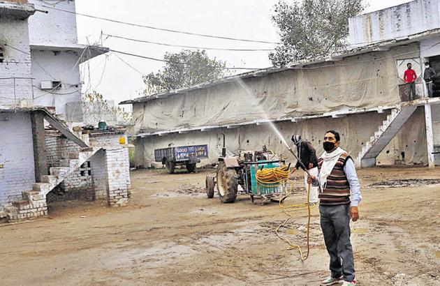 A poultry farm being sanitised in Barwala, Panchkula, on Wednesday. The poultry belt here is considered second largest in Asia, producing 1 crore eggs daily at around 110 farms.(Sant Arora/HT)