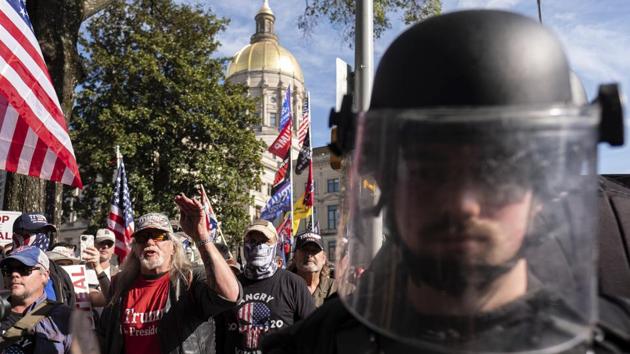 Angry supporters of President Donald Trump stormed the US Capitol on Wednesday in a chaotic protest aimed at thwarting a peaceful transfer of power(AP)