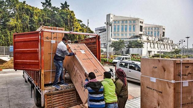 Refrigerators to store Covid-19 vaccines being unloaded on Thursday at Rajiv Gandhi Super Speciality Hospital, the Capital’s central storage facility. Refrigerators to store Covid-19 vaccines being unloaded on Thursday at Rajiv Gandhi Super Speciality Hospital, the Capital’s central storage facility.