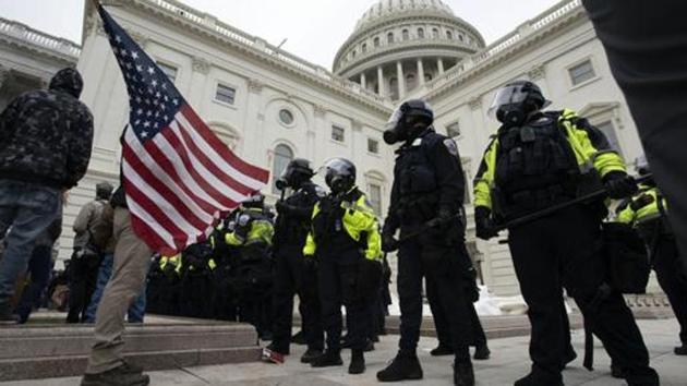 US Capitol Police officers push back demonstrators who were trying to break into the Capitol (AP) US Capitol Police officers push back demonstrators who were trying to break into the Capitol (AP)