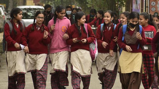 Entry was allowed from the main gate of the school and circles were drawn to ensure social distancing . Staff were deployed for thermal screening of each student.(Harsimar Pal Singh/HT)