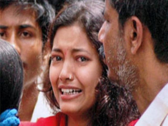 A relative of the one of the bomb blast victims mourns at Athgaon area of Guwahati on Saturday. Six people died on the spot and more than 15 people were seriously injured in this bomb blast,suspected to be executed by ULFA, that took place at the crowded Athgaon area, which is one of the main business localities of Guwahati.